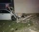 Car slams into house