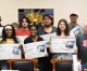 Students presented laptops at Rotary