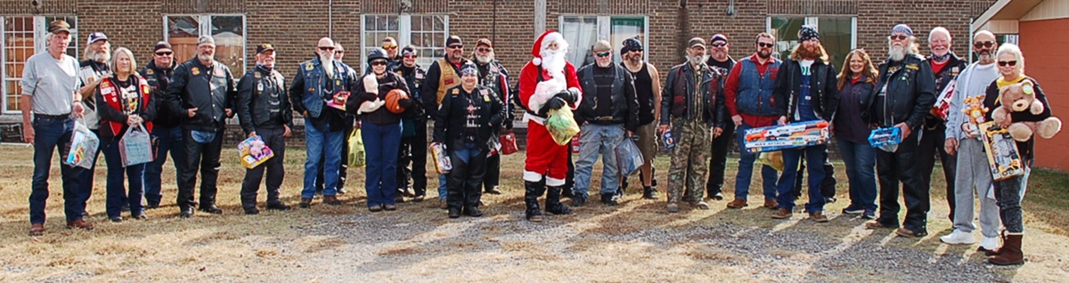 Swampriders donate toys to Chamber